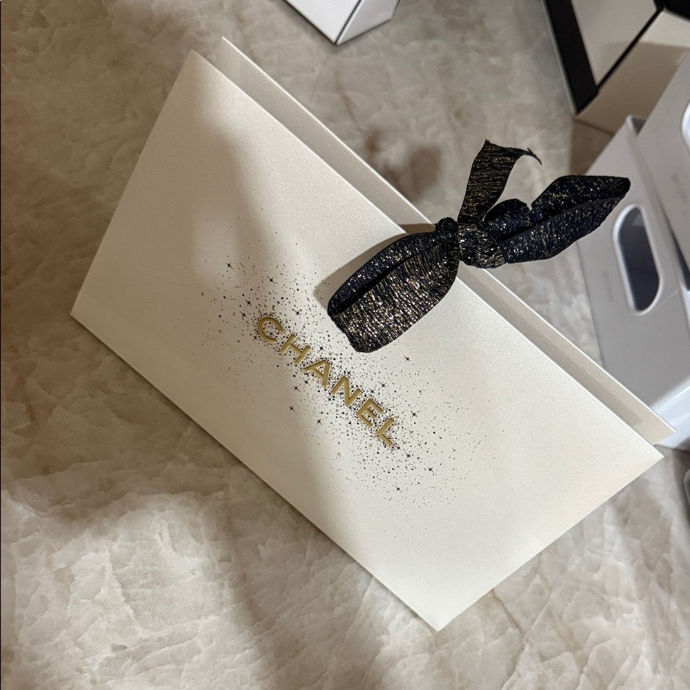Chanel Cream Bag with Black Glitter Ribbon